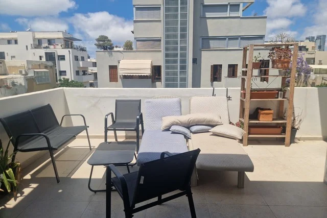 Grande terrasse privative avec salon extérieur