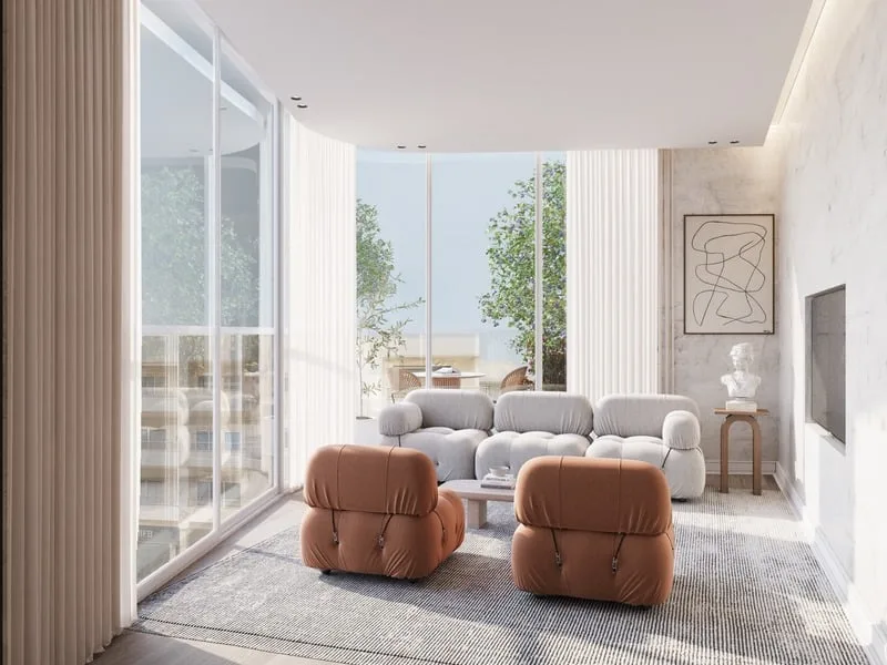 Salon lumineux avec fauteuils Camaleonda et terrasse arborée