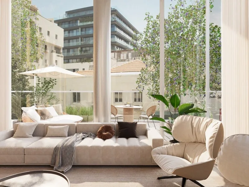 Salon lumineux avec grandes baies vitrées donnant sur la terrasse